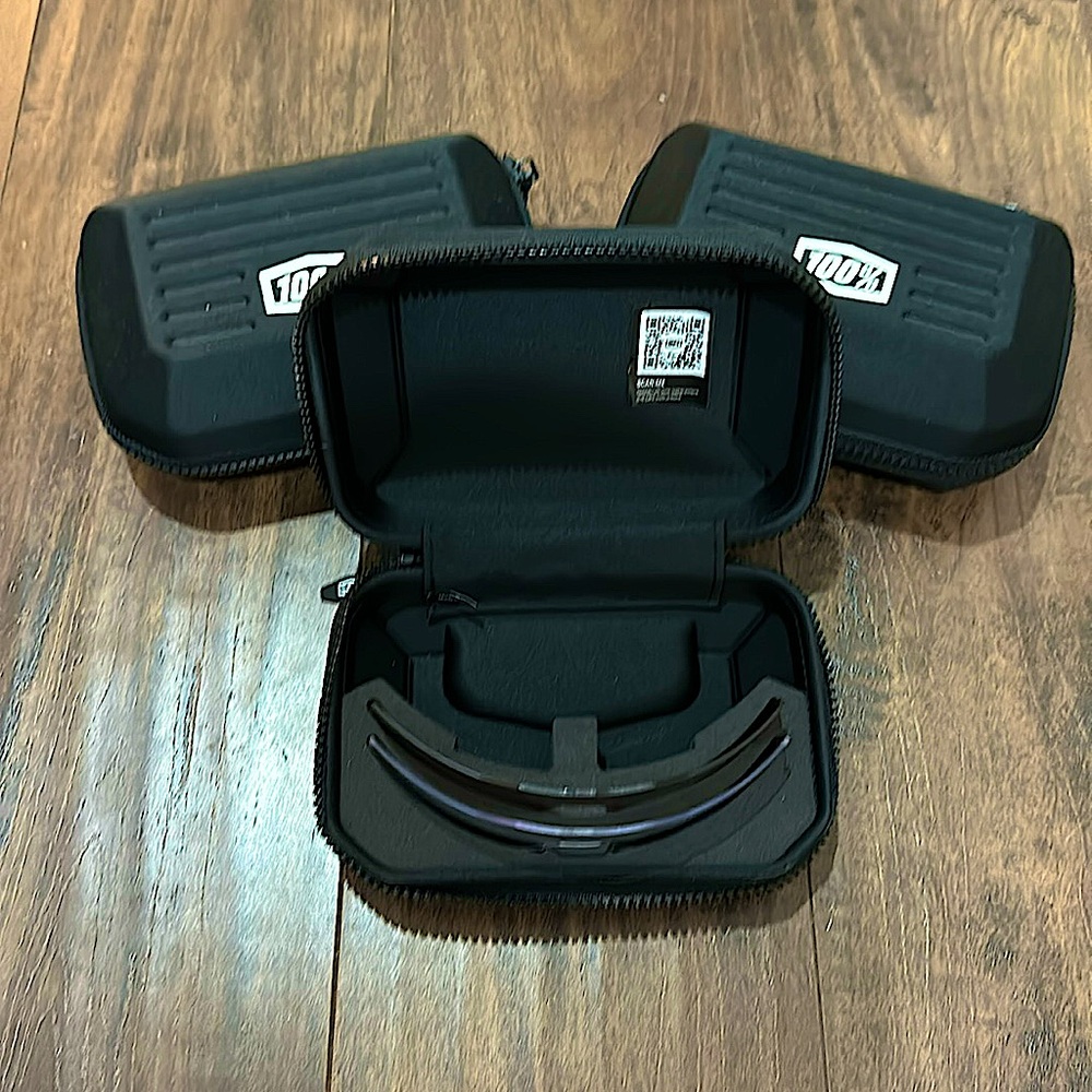 100% Sunglasses Case. Insert for multiple lenses. Hard case w/ durable zipper.